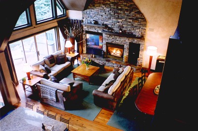  Grand open floor plan great room with cozy fireplace, flat screen TV and enormous vaulted ceiling